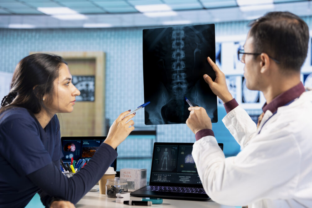 indian healthcare professional sharing medical expertise with patient office